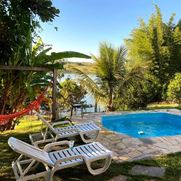 Casa com piscina fundo pra represa e AR Condicionado CasinhaBrancaDeVaranda